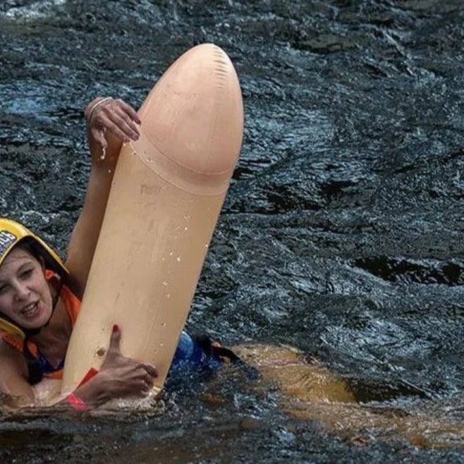 Swimming on an inflatable penis